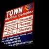 Town Medical Complex - Logo