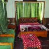 Greens Hotel Kalam bedroom pic 3