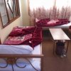 Peshawar Palace Hotel bedroom pic 2