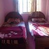 New Aashan Hotel Double Bedroom