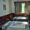 Greens Hotel Kalam bedroom pic 2