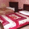 Hotel Kahkashan Triple Bedroom