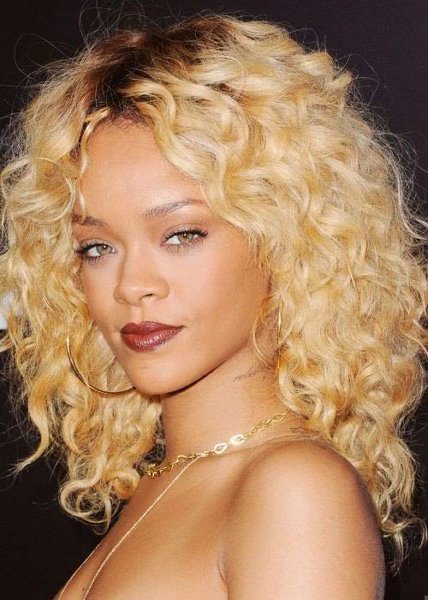 12 Best Rihanna Hairstyles She Has Had Till Now-Simple Honey Blonde Curls
